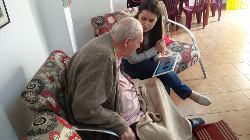 A man in Brazil tests the Israeli Clara chatbot for early Alzheimer diagnosis.