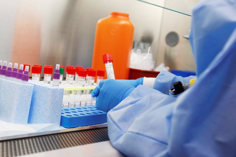 A medical technologist tests a respiratory panel at Northwell Health Labs, where the same test will be used on the COVID-19, the disease caused by the novel coronavirus, after being authorized to begin semi-automated testing by the US Food and Drug Administration (FDA) in Lake Success, New York, U.S.